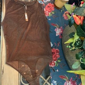 Skims shimmer bodysuit!
